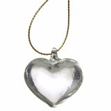 A chic glass heart decoration with a gold string hanger. A translucent Christmas decoration with glass hook. 