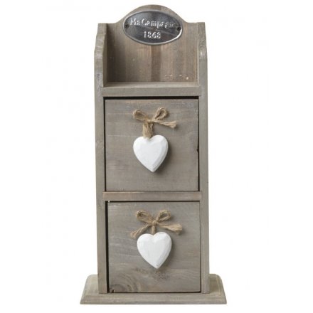Wooden storage chest with two drawers and white heart decorations on the front