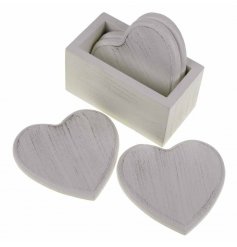 These cute heart coasters will look great in any home. Complete with holder. 