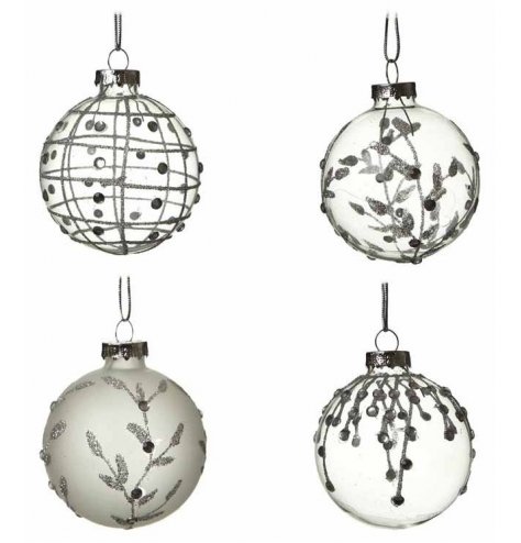 An assortment of stunning clear glass baubles, each with a unique design featuring pattern, glitter and diamontes.