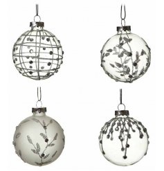 A set of 4 clear and frosted glass baubles with winter designs. 
