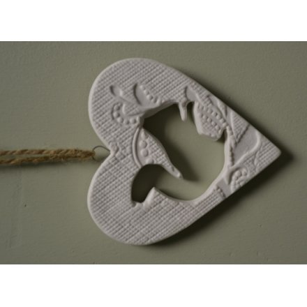 Ceramic deer and squirrel hanging heart decorations with patterned print and jute string to hang. 
