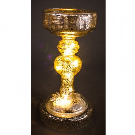 Decorative glass candle holder with speckled finish and light up function. 