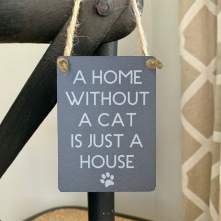 Small metal sign with popular cat text and paw print illustration. Finished with curved edges and jute string to hang.