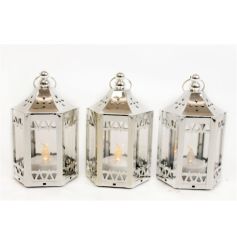 Silver lanterns with an LED battery powered light inside