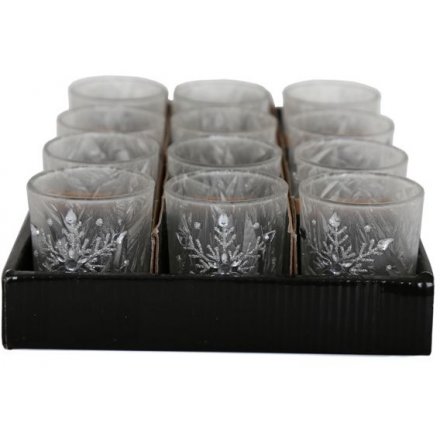 A stunning votive t-light holder with frosted glass and an ornate glitter and sequin silver snowflake.