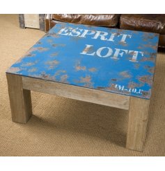 With its overly distressed blue toned top and chunky wooden legs, this large coffee table will add a Rustic Charm to any