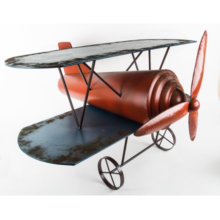 A stylish red and blue toned coffee table in a fun Aeroplane design 