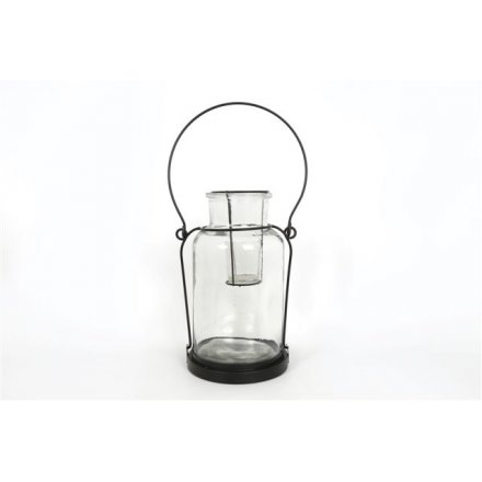 Glass lantern in a rustic style for the home or garden