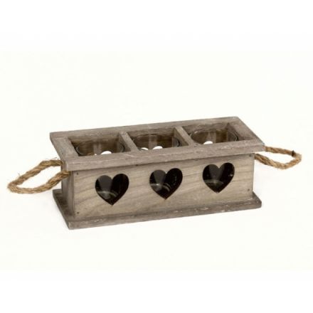 A rustic wooden tray with three glass t-light holders and chunky rope handles.