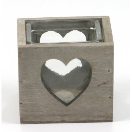 Glass candle holder in a wooden heart cutout tray