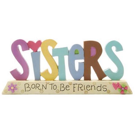 A colourful and cute 'Sisters Are Born To Be Friends' sign with heart and floral patterns.