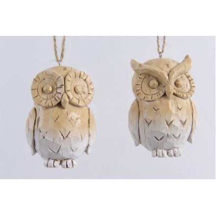 An assortment of 2 chunky hanging owl decorations with a handmade finish.