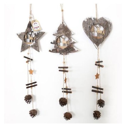 A mix of 3 rustic wooden decorations with intricate festive scenes and hanging stars and pinecones.