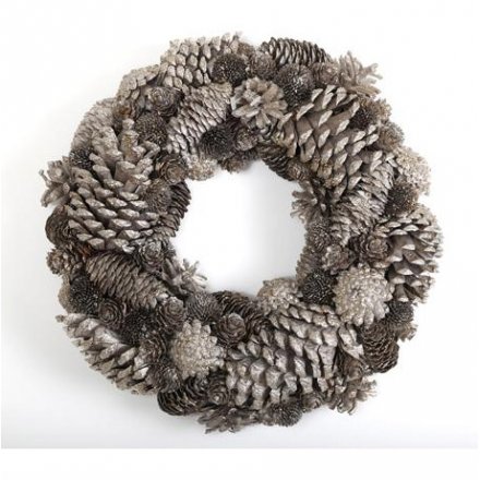 A stunning natural gold wreath made from pinecones.