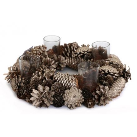A stunning pinecone wreath decoration with 4 glass candle holders. A beautiful decoration this season.