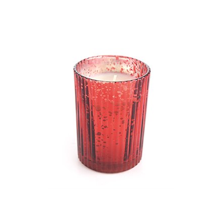 A beautiful antique style glass pot with a cinnamon scented candle.