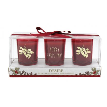 A set of 3 spiced cinnamon scented candles in beautiful red and gold festive jars.