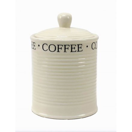 A ceramic cream tea canister with classic COFFEE script and a country cottage appearance. 