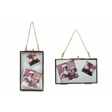 A mix of 2 landscape and portrait hanging frames with a distressed finish and jute rope.