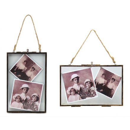 A mix of 2 landscape and portrait hanging frames with a distressed finish and jute rope.
