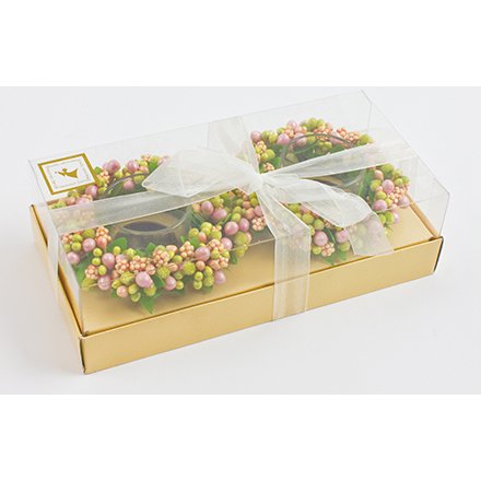 Two candle holders with festive decoration and gift box