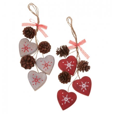 An assortment of 2 hanging decorations with hearts and winecones