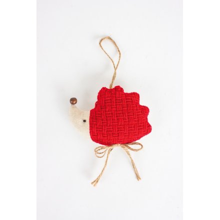 An adorable fabric reindeer decoration with a rustic bow and bell nose.