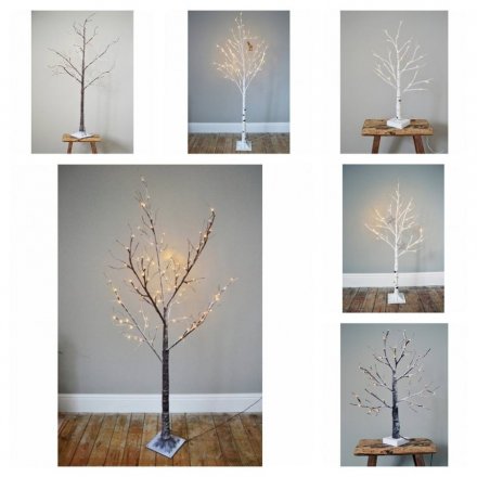 snowy twig tree with lights