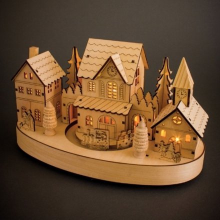 Festive wooden Christmas scene with intricate detail