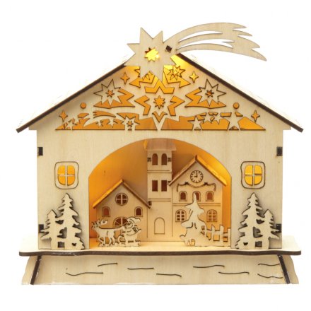 A wooden Christmas scene with intricate detail and pretty LED lights