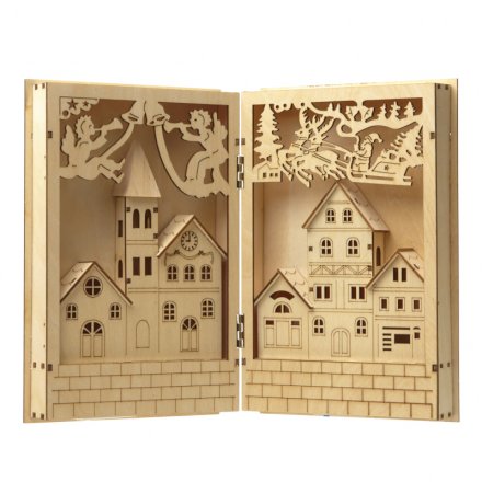 A wooden book style ornament with pretty LED lights and scene