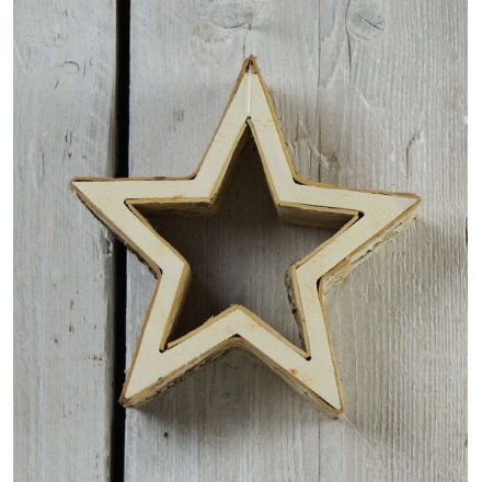A stylish chunky star decoration made from wood with birch detailing.