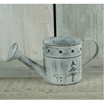 Zinc watering can in a whitewashed design with festive images
