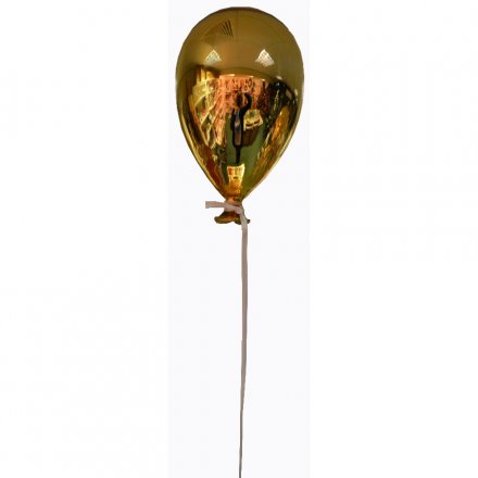 A large gold balloon decoration for use in the home