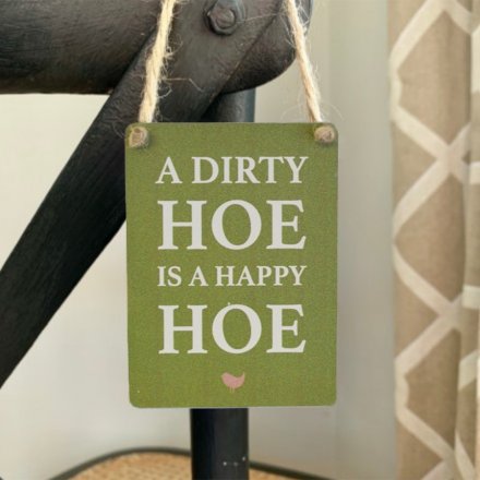 A mini metal sign with rustic jute string to hang and a humorous garden slogan.