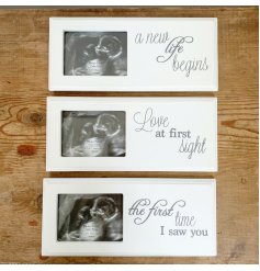 An assortment of 3 classic white baby scan picture frames with sweet text