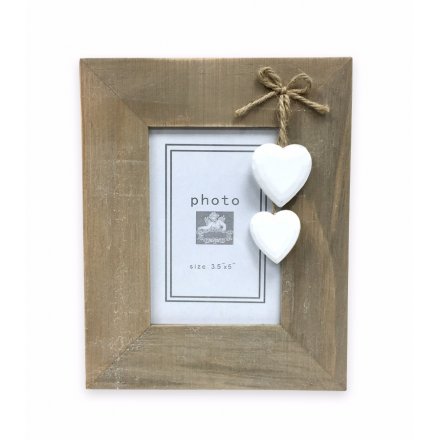 Standing shabby photo frame with solid white heart decorations