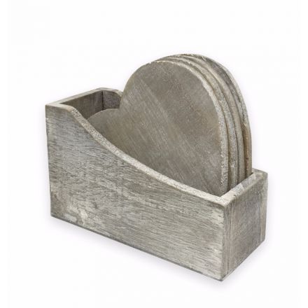 Rustic wooden coasters in heart shape, complete with wooden stand. 