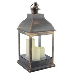 Gold coloured lantern with LED flameless candles inside