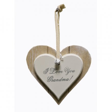 A wooden heart plaque with I Love You Grandma text