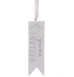 A white wooden tag on a ribbon with you are invited script