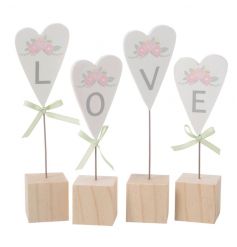 Set of four wooden hearts with Love lettering