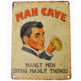 Vintage 'Manly Men Doing Manly Things' metal sign.