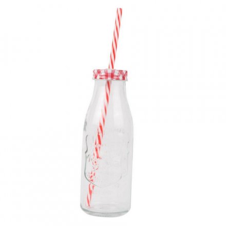A vintage style glass milk bottle with lid and straw 