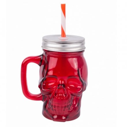 A deep red coloured drinking jar in a skull design with straw