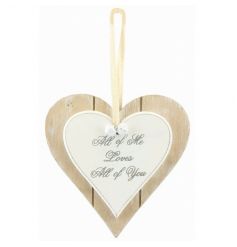 A chic wooden heart plaque with cute Love quote