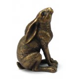 A stunning bronze hare ornament in a gazing pose. A stylish decorative accessory for the home. 