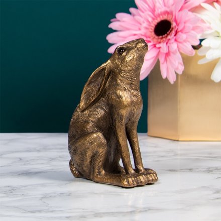 A stylish bronze hare ornament in a sitting pose. An on trend and timeless accessory for the home.