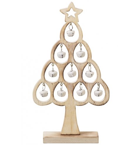 A rustic wooden alpine tree with a star topper and white jingle bell hangers.
